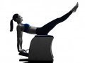 depositphotos_123215746-stock-photo-woman-pilates-chair-exercises-fitness